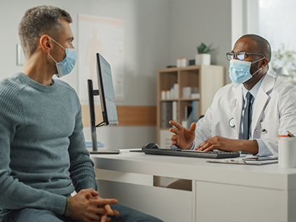 Patient speaking with his doctor