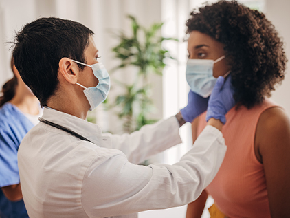 Physician talking to patient