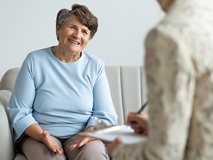 Woman meeting with support services.