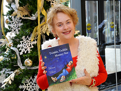 Judy holding her book.