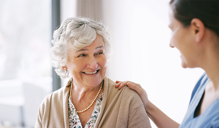 Nurse with senior patient.