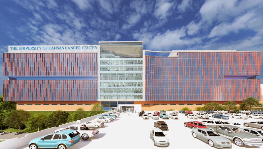 Architectural rendering of KU Cancer Center's planned new research and patient care facility, a large, rectangular building with exterior windows wrapping the building, with cars in parking garage in the foreground