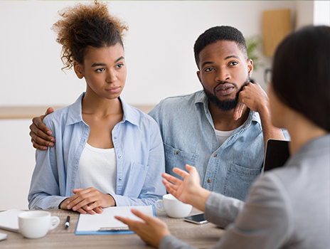 Couple in a meeting.