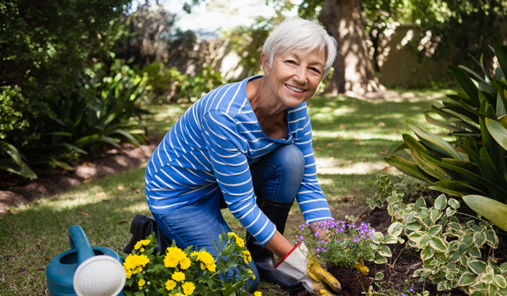 Cancer patient gardening after recovering from successful uterine cancer treatment.