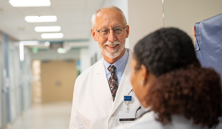 Two doctors talking.