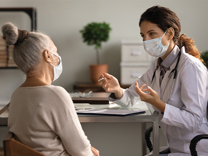 Patient speaking with her doctor