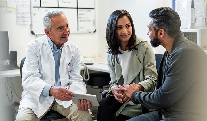 Doctor meeting with patient.