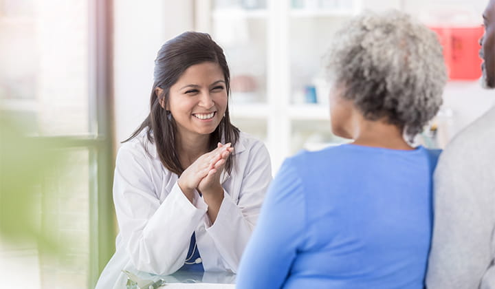 Doctor meeting with patient.