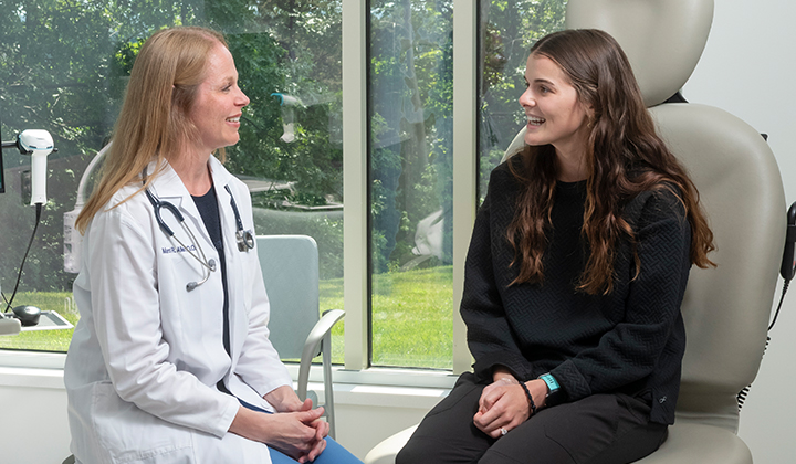Physician meeting with patient