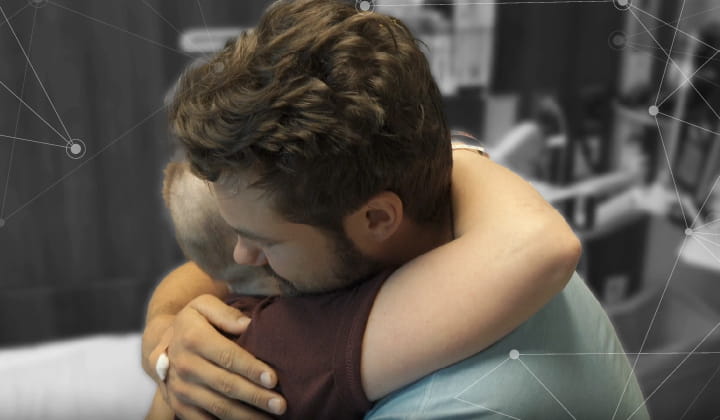 Two people hugging
