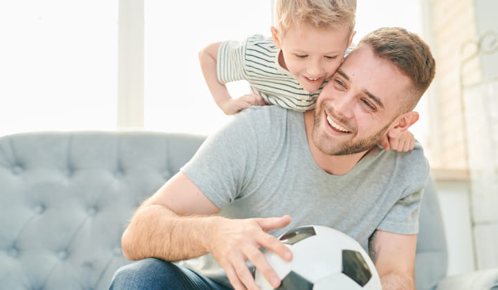Dad with young son.