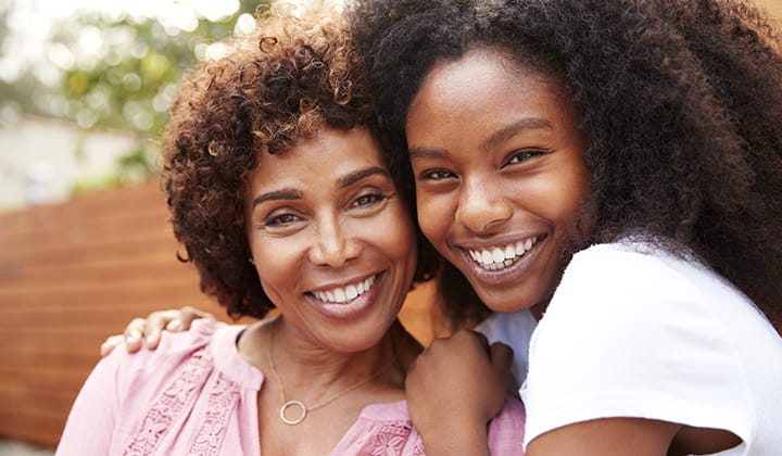 Mom and Daughter Smiling