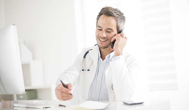 Doctor on phone.