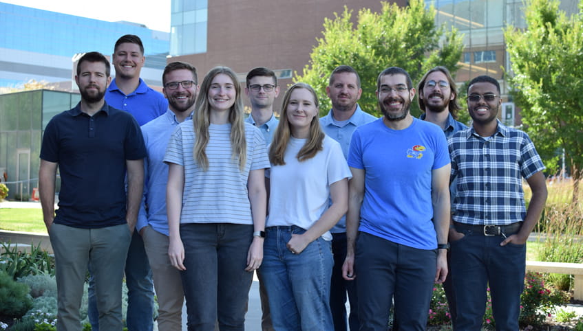 Members of the Freudenthal lab stand outside smiling