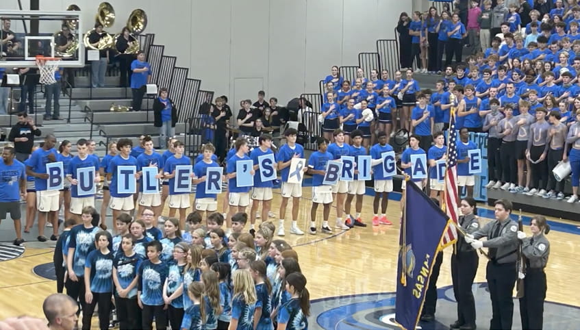 Students holding letters spelling Butler's Brigade