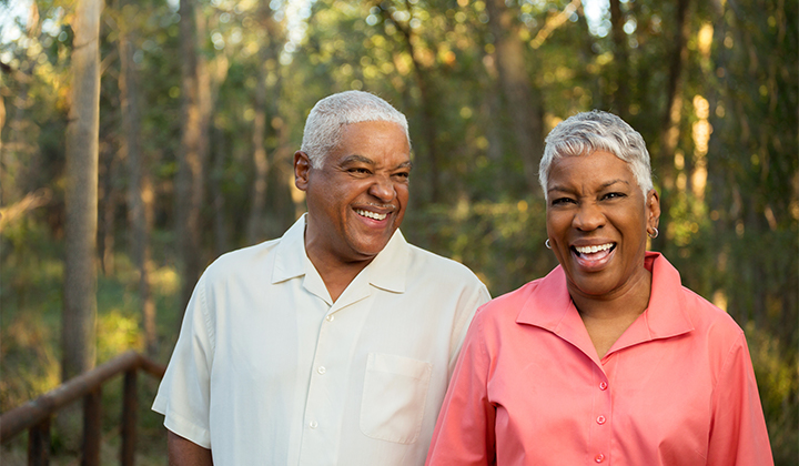 Couple outside smiling