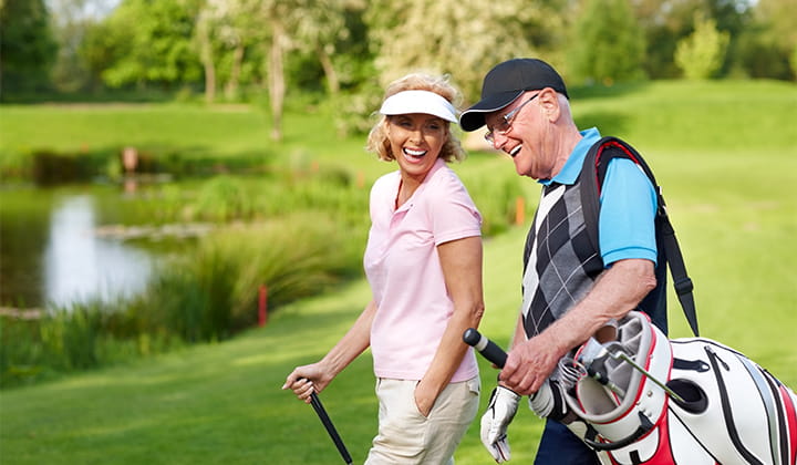 Couple playing golf