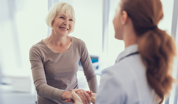 Woman meeting with doctor.