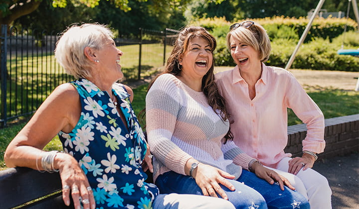 Group of friends laughing.